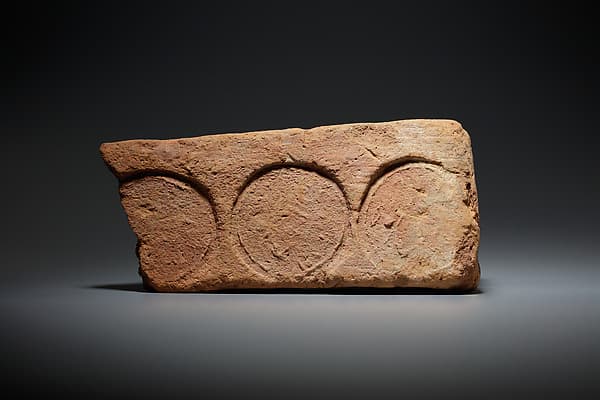Brick Stamped with a Circular Seal