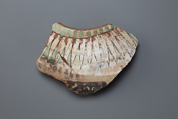 Decorated jar fragment with inscription