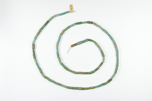 String of Cylindrical Beads