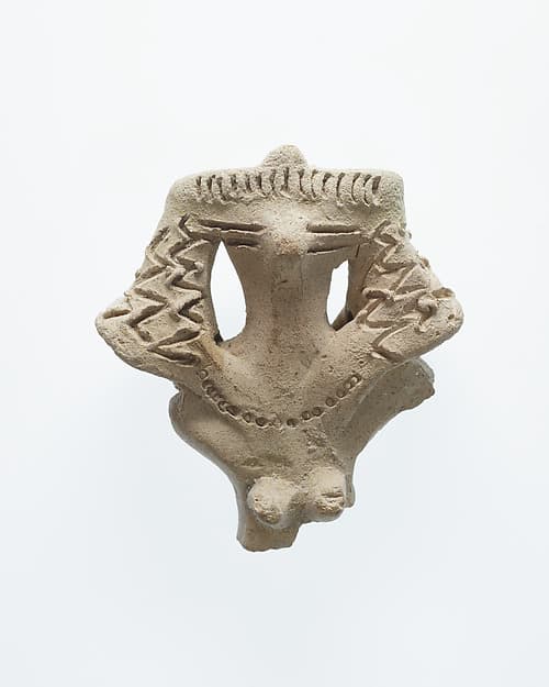 Upper Half of a Female Figurine