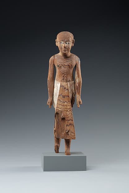 Figure of a Standing Man with a Long Kilt