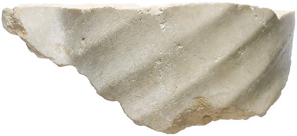 Leg (?), with pleated garment
