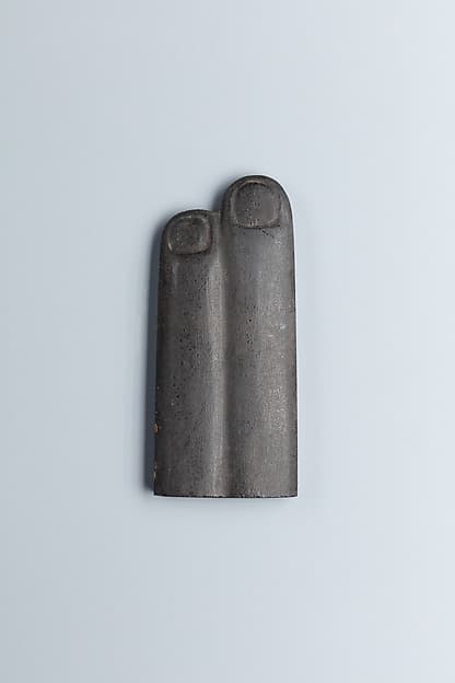 Two-finger amulet