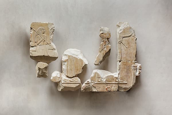 Relief fragments from the tomb of Queen Neferu: male and female attendants