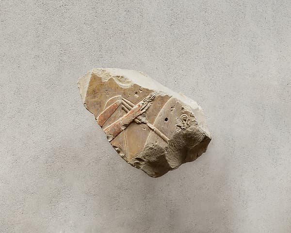 Relief from the tomb of Queen Neferu: female attendant carrying a sunshade (see 26.3.353-1)