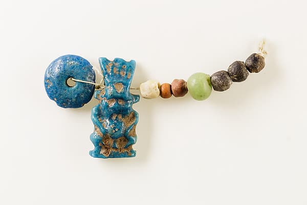 String of Beads and Bes Amulet