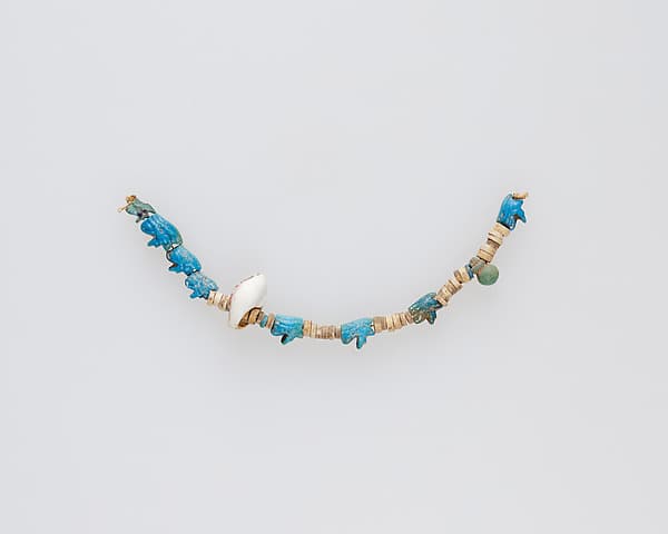 String of beads and amulets