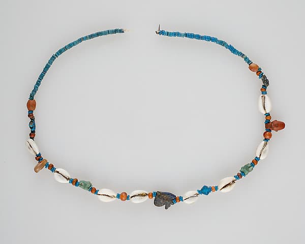String of beads and amulets (wedjat eyes)