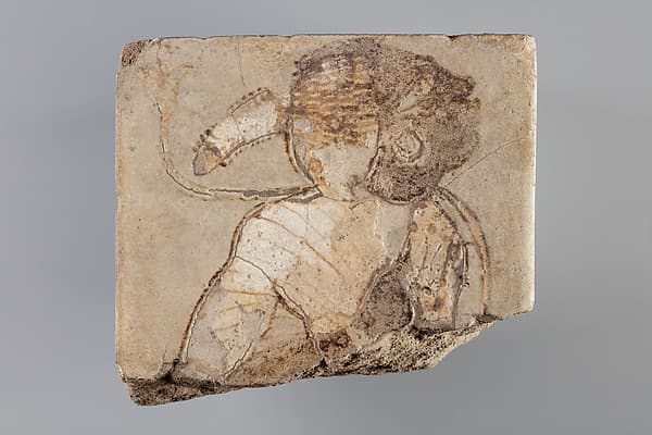 Tile with a bound Nubian from the the side of a dais