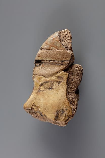 Tile with a fragment from a head of a Mesopotamian captive from the palace of Ramesses II