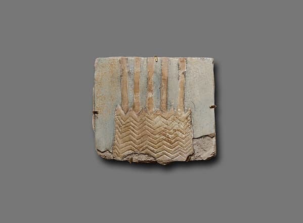 Tile with five stems of a papyrus plant