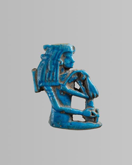 Amulet of seated goddess / queen with ankh and flail
