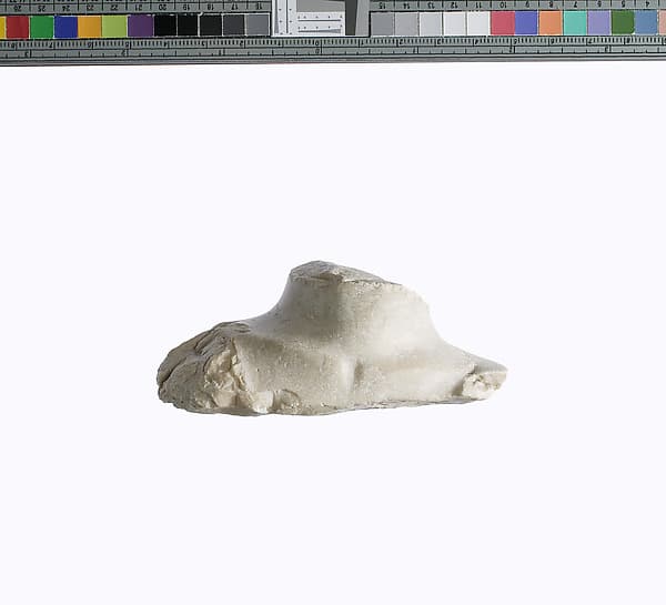Chest of statuette of Akhenaten prostrate (?)