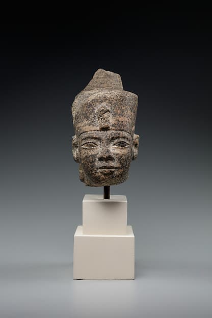 Head of a king in the red crown