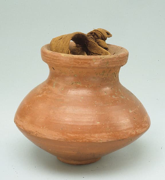 Small Carinated Jar with Cloth Lid