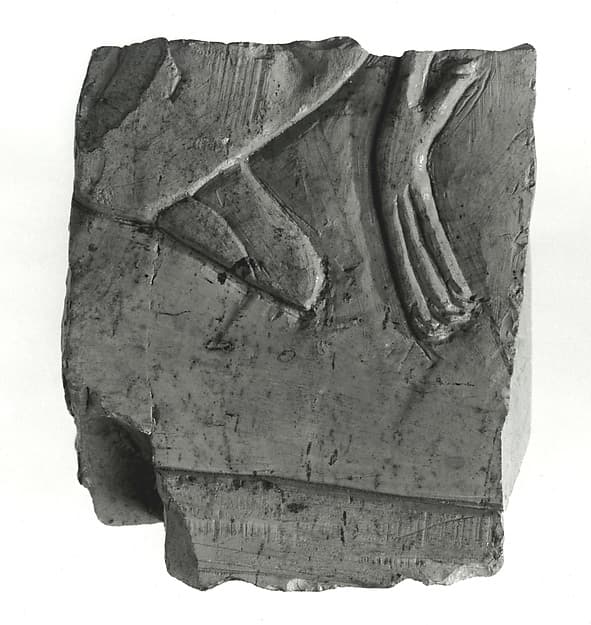 Raised relief fragment with a hieroglyph