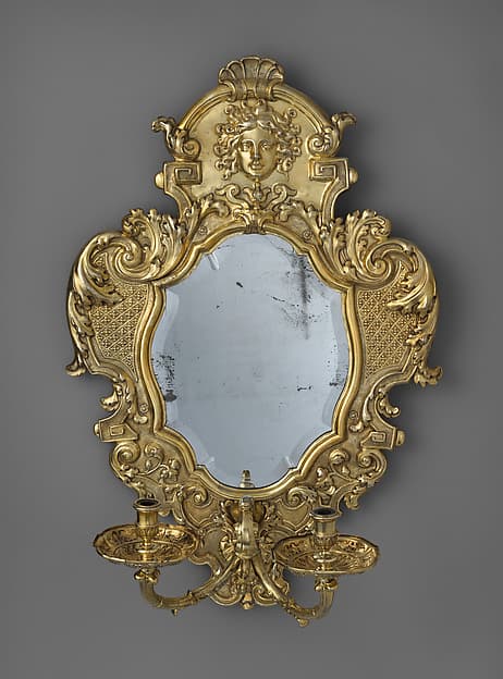 Monumental mirror sconce (one of a pair), by Peter Rahm