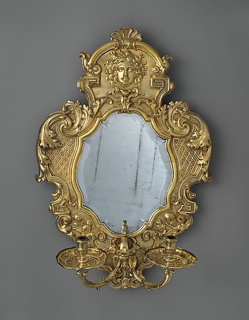 Monumental mirror sconce (one of a pair), by Peter Rahm