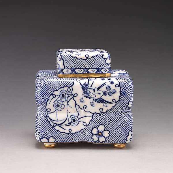 Tea caddy in the form of a tea bundle, by Minton(s)