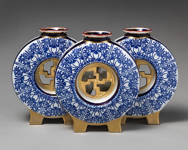 Triple moon flask with fretwork center (one of a pair), by Worcester factory