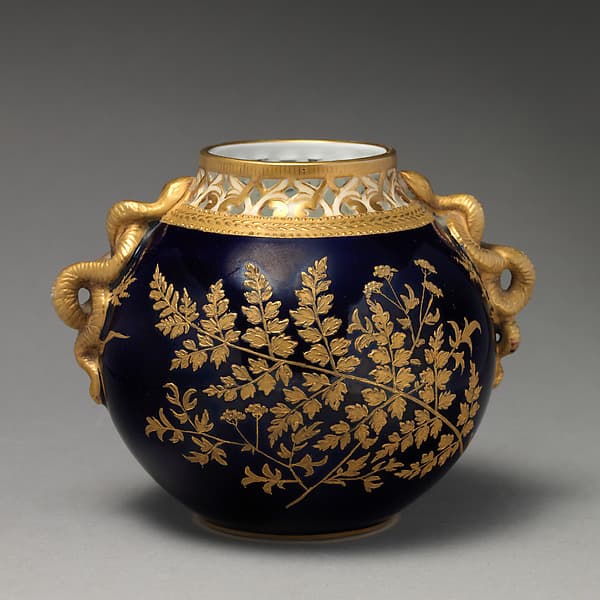 Orb vase with gold fern motif, by Grainger