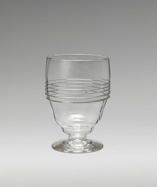 Footed goblet with bulging bowl, by Philip Webb