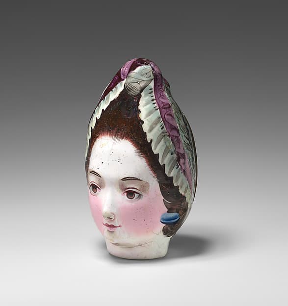 Head of a woman bonbonnière