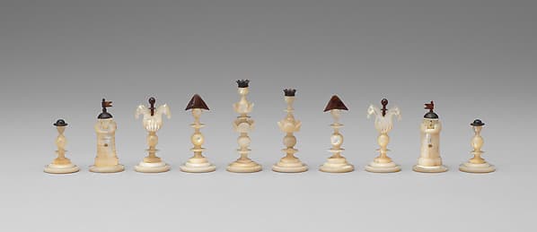 Chessmen (32) and box-board
