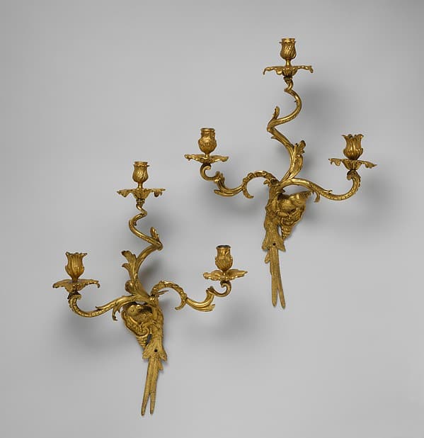 Set of four three-light wall brackets, by Charles Cressent