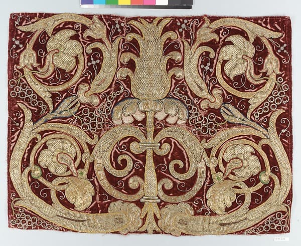 Golden tendrils against a red ground
