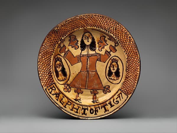 Display dish with a cavalier and portrait medallions, by Ralph Toft