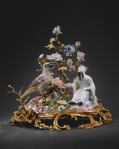 Chinese figure with bird, by Meissen Manufactory