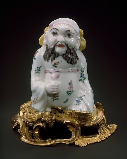 Figure of a seated Chinese man, by Mennecy