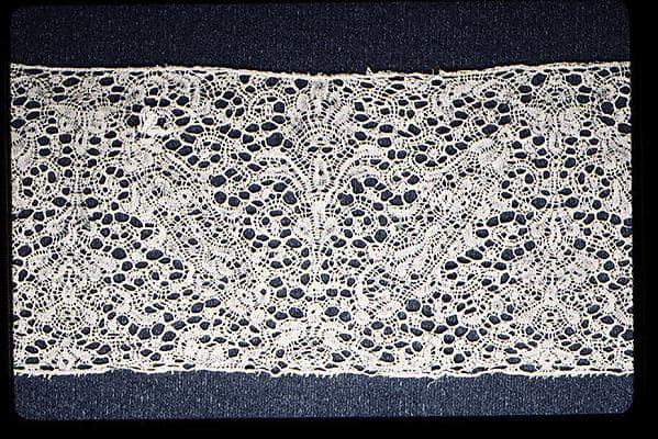 Pair of lappets and joined cap edging
