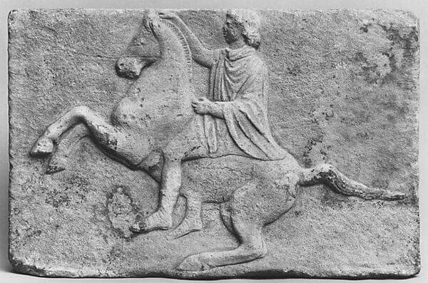 Marble relief with a horseman