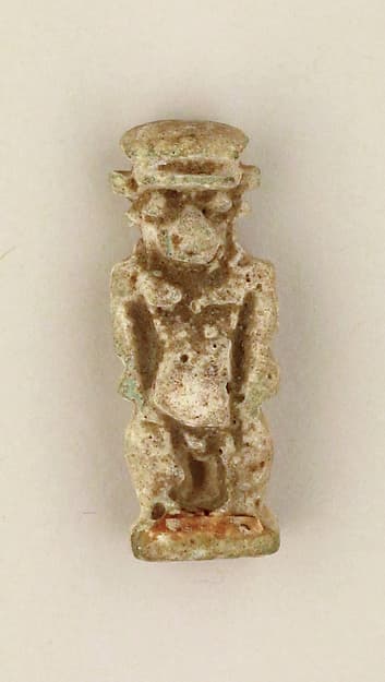 Faience amulet in the form of the dwarf god Pataikos