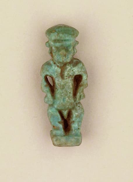 Faience amulet in the form of the dwarf god Pataikos