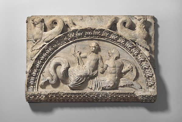 Marble lunette with Nereid riding Triton