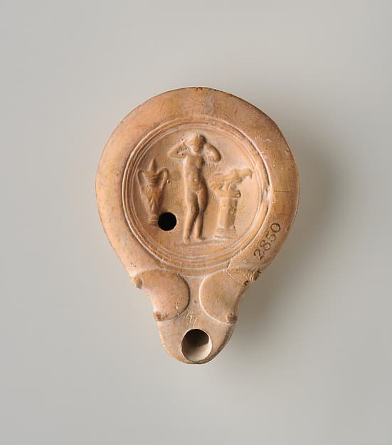 Terracotta oil lamp