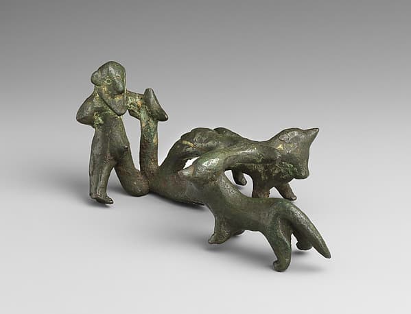 Bronze statuette of a plowing scene