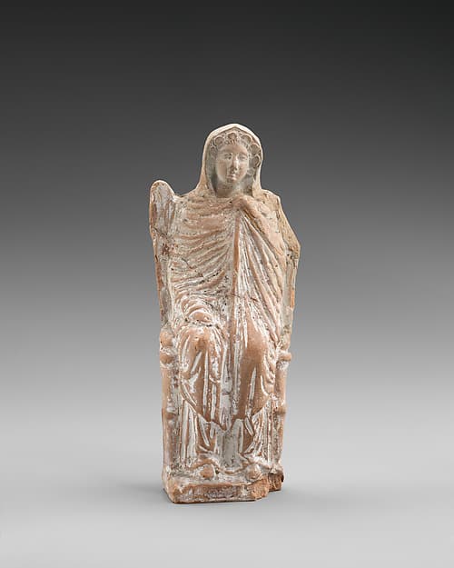 Terracotta statuette of a seated goddess