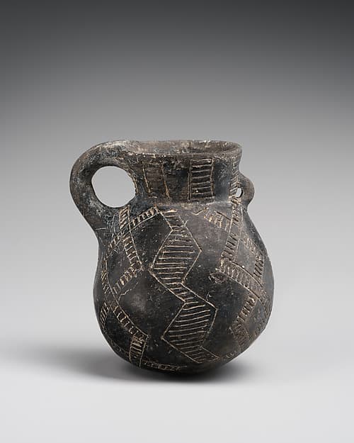 Terracotta juglet