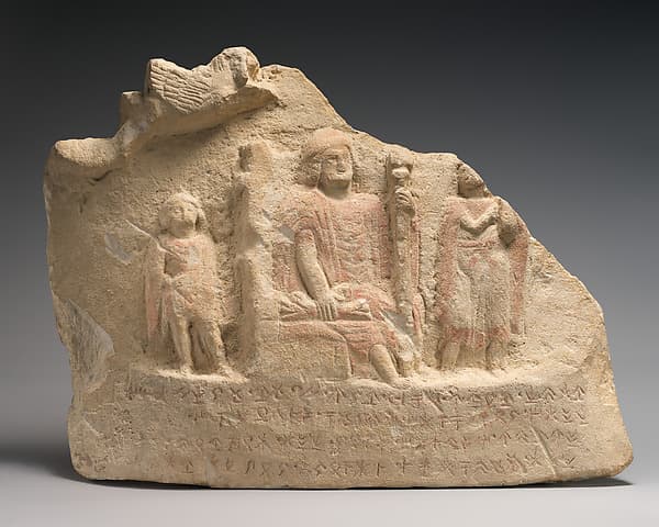 Limestone inscribed relief