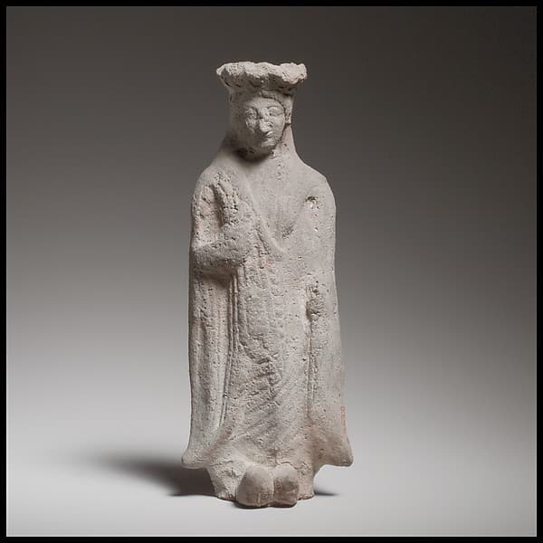 Terracotta statuette of a standing woman