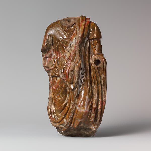 Jasper statuette of a man wearing a toga