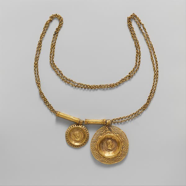 Gold necklace with coin pendants