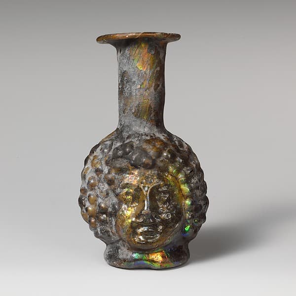 Glass double head-shaped bottle