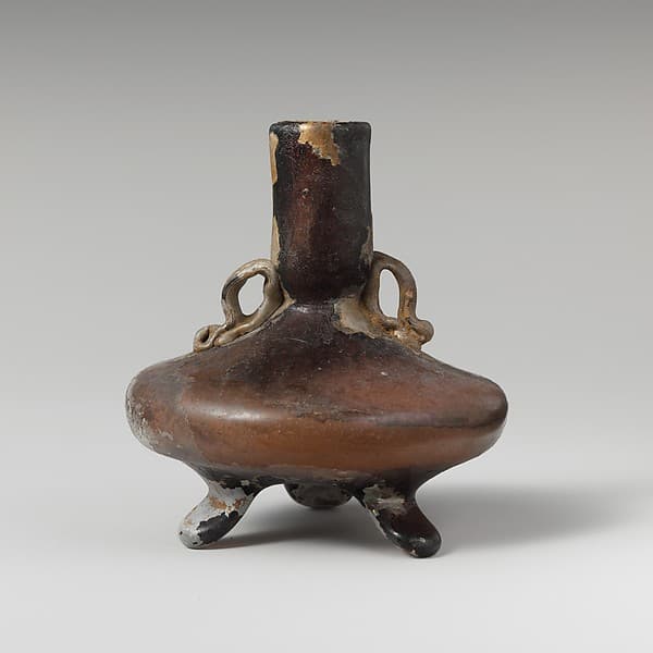 Glass bottle with three feet