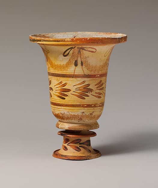 Terracotta flaring bowl on stand