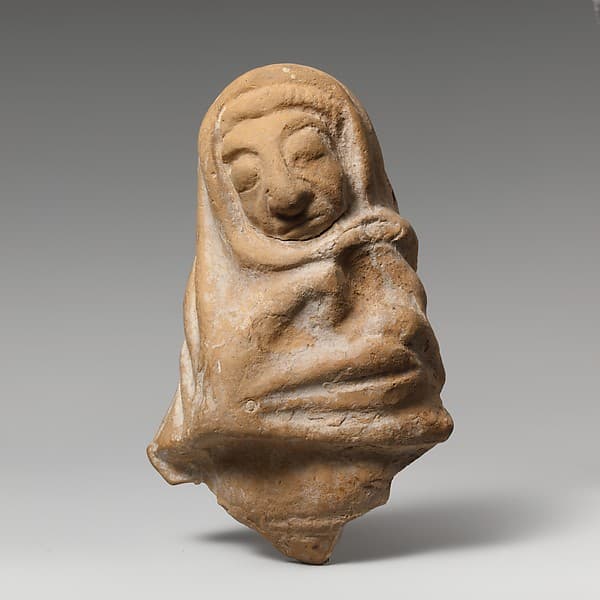 Fragment of a terracotta statuette of an old woman